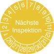 Prüfplakette mit Jahresfarbe